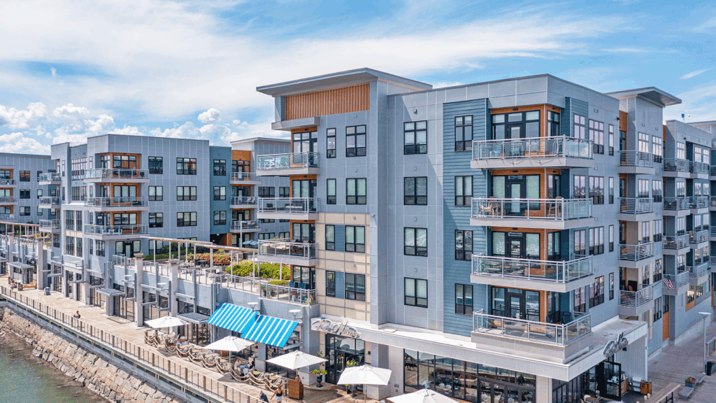 Multifamily space featuring aluminum railing with glass panel infill.