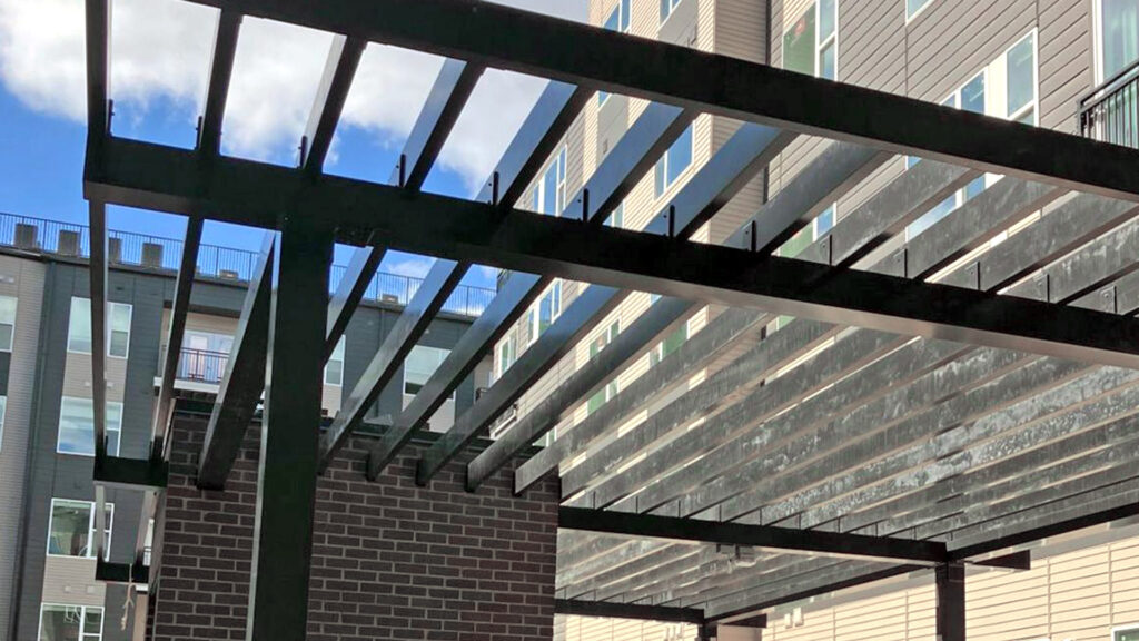 Aluminum sunshade structure at a multifamily project.