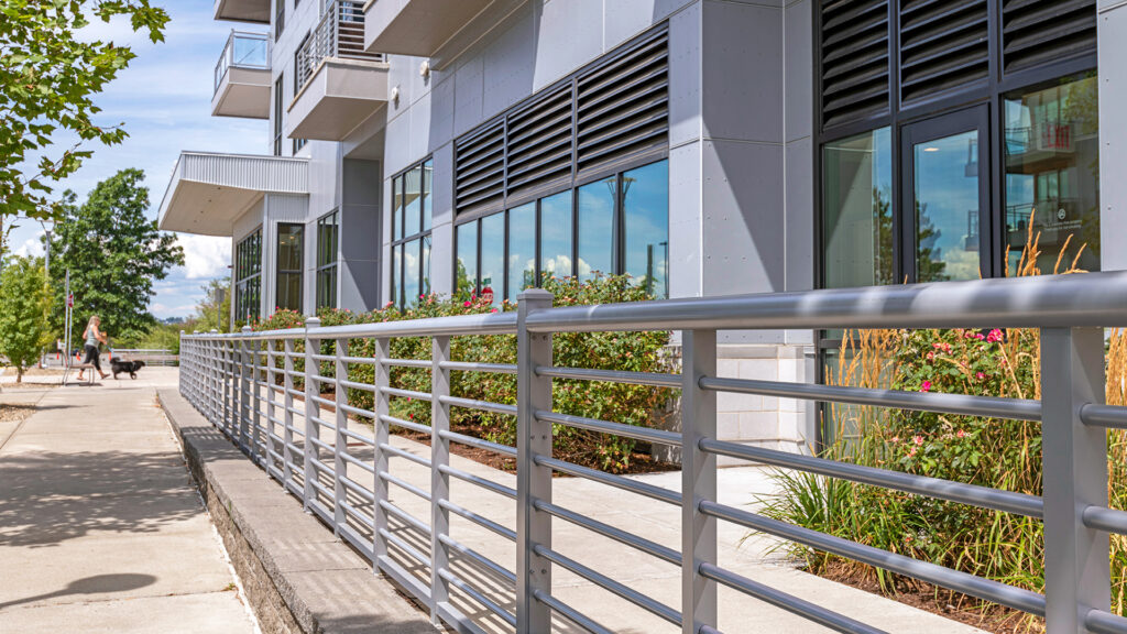Aluminum powder-coated railing installed for a student housing project.